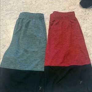 2 Pair of Two-Tone Size L 10-12 Athletic Skirts - Teal & Red with Black Panels